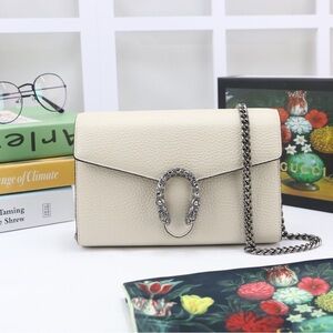 Gucci Elegant Cream Clutch with Chain Detail
